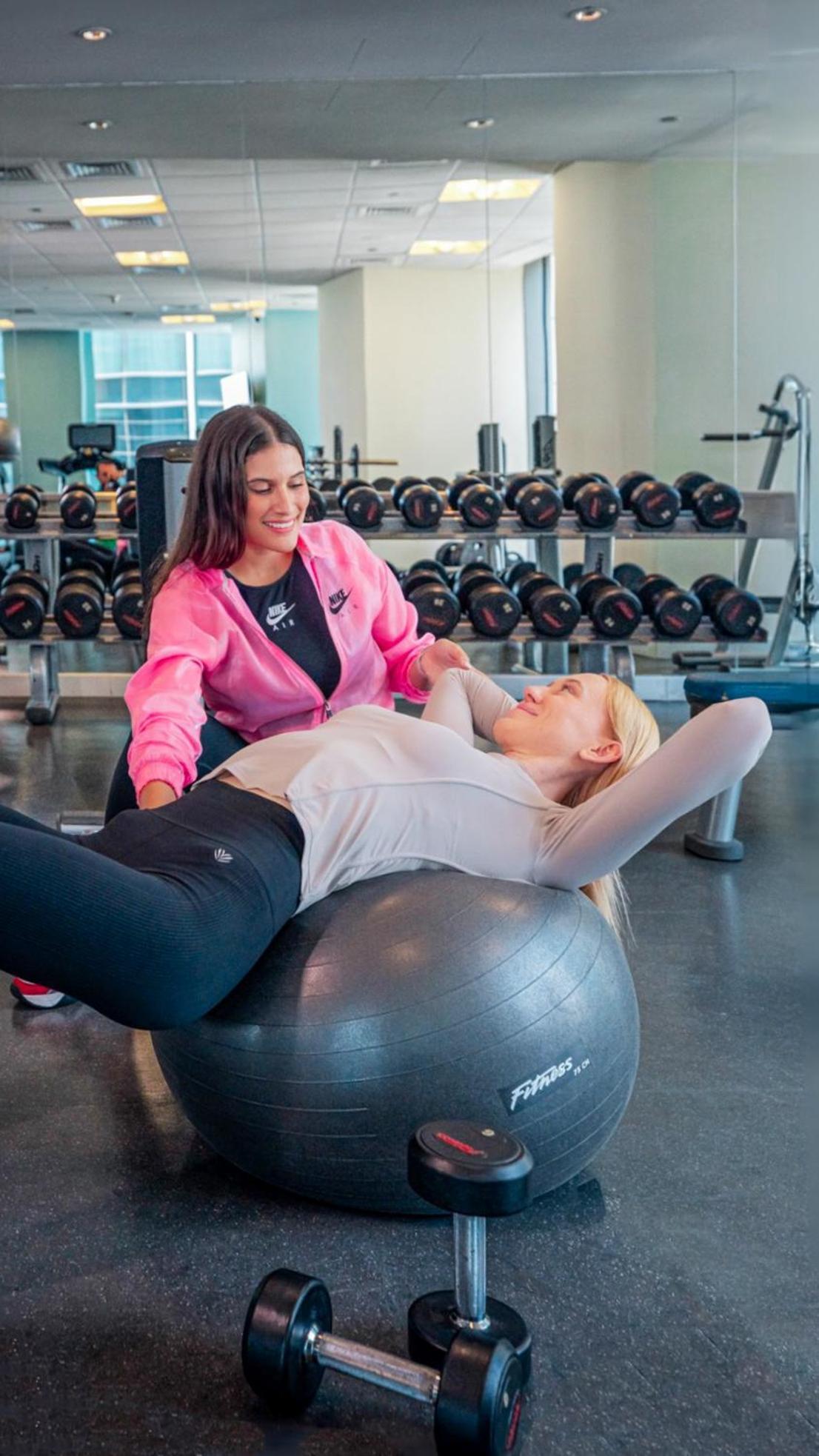 City Centre Rotana Доха Екстериор снимка A personal trainer working with a client