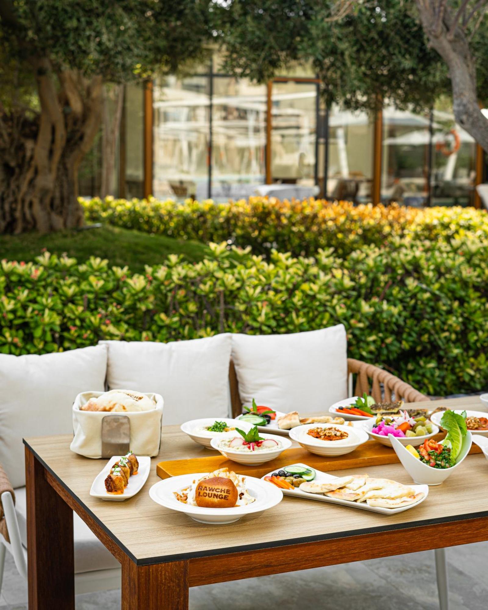 City Centre Rotana Доха Екстериор снимка A selection of dishes at the restaurant