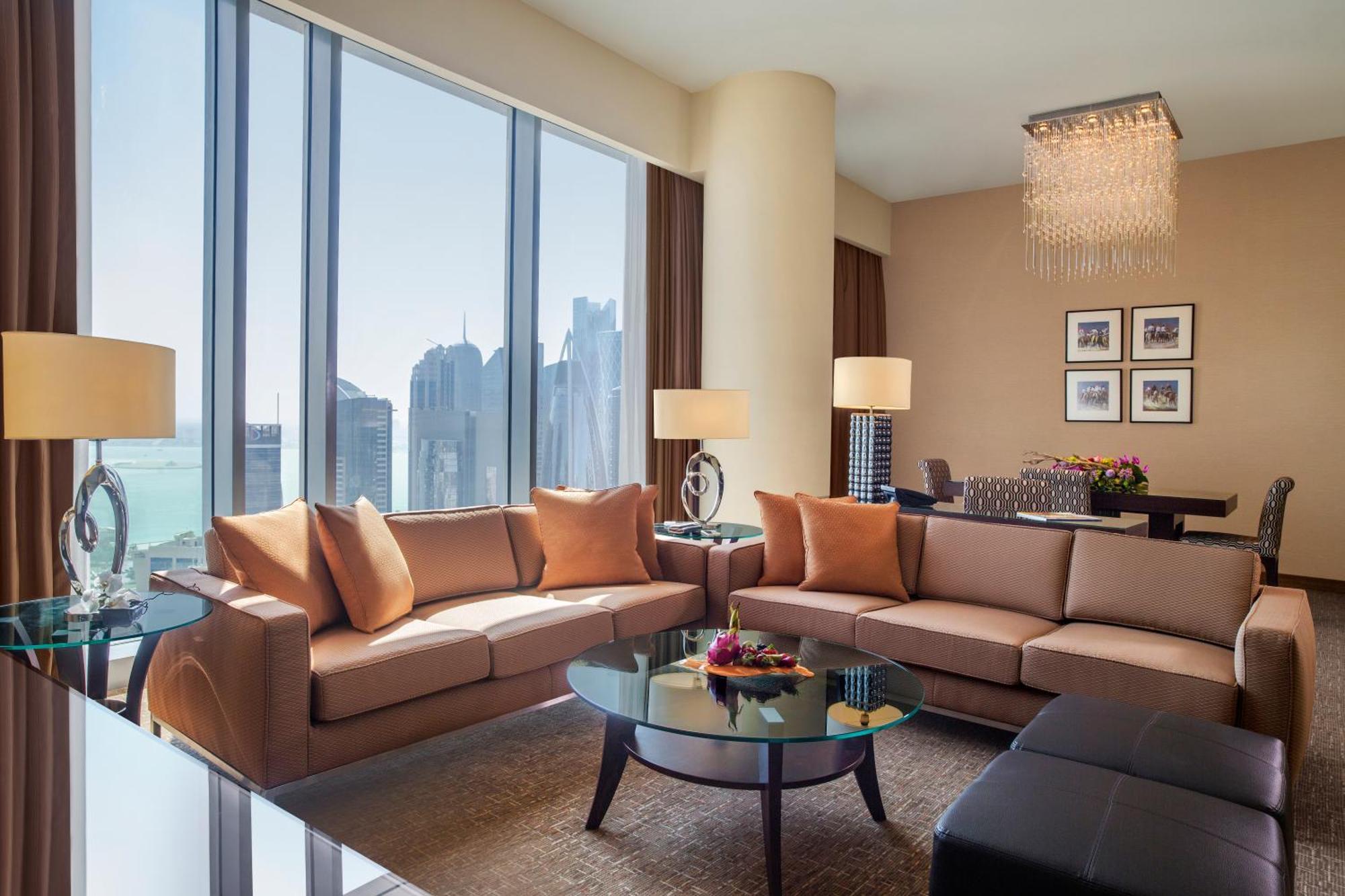 City Centre Rotana Доха Екстериор снимка A living room in a suite at the Ritz-Carlton, DIFC